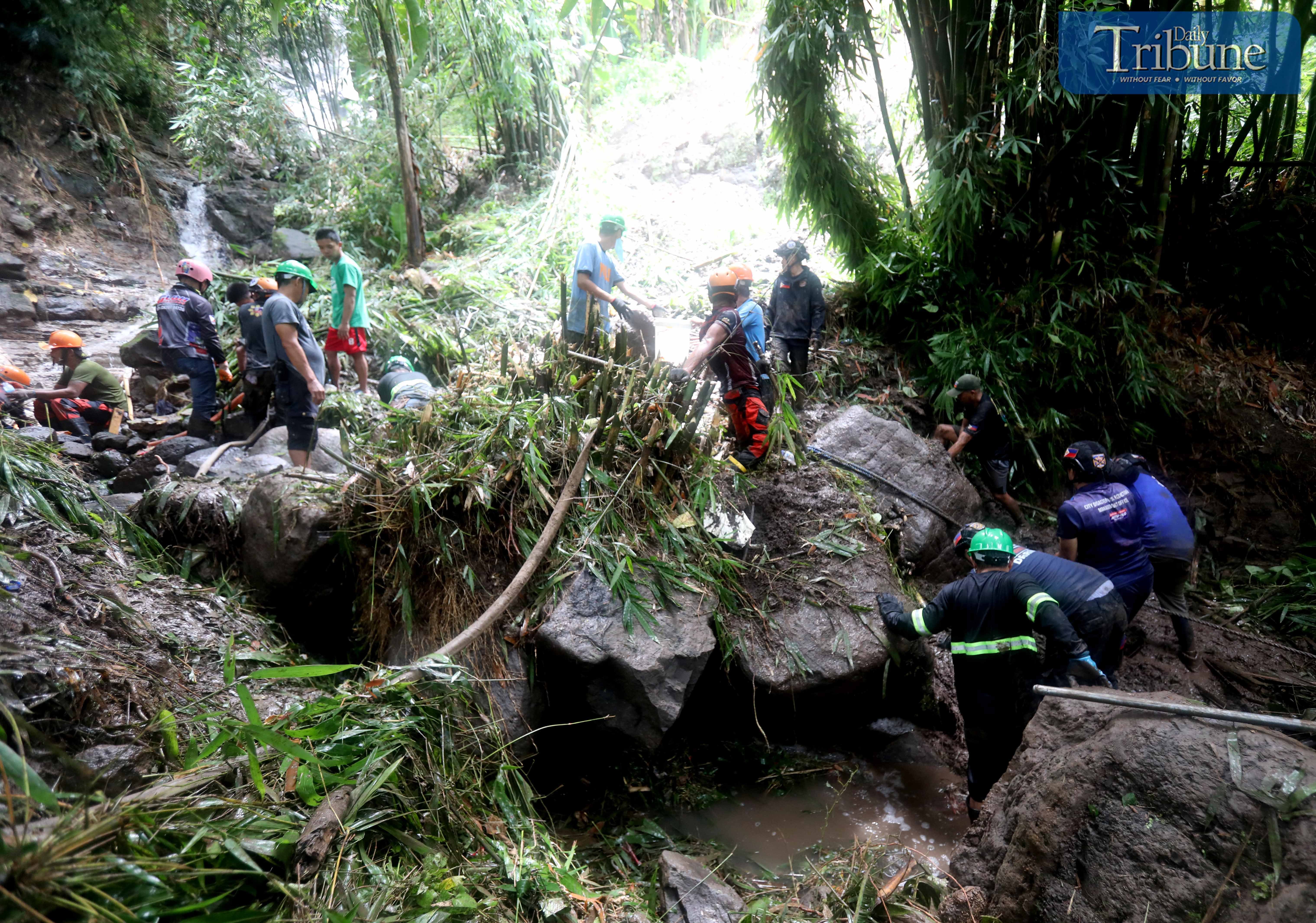 LOOK:  Authorities are conducting a retrieval operation for three of the four victims in Sitio Banaba, Brgy San Luis, Antipolo on Tuesday, 3 September 2024. The four individuals were confirmed dead after their house fell 75 feet into a ravine due to a landslide caused by Typhoon Enteng on Monday.